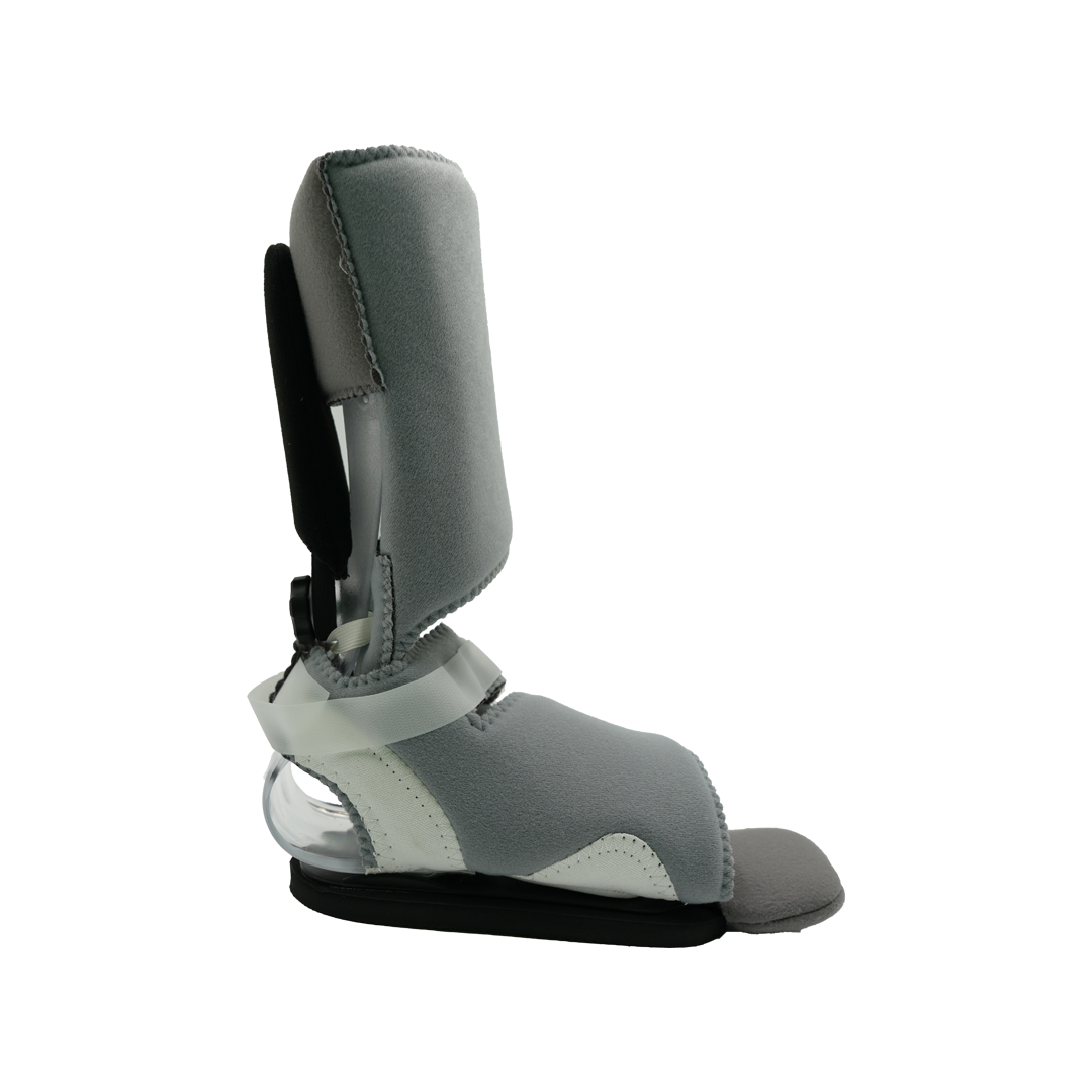 Gray and black ankle foot orthosis with padded calf support and ambulatory attachment.