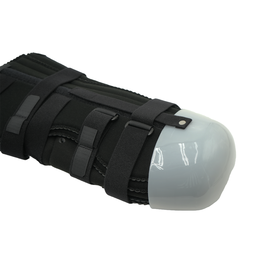 Black below-knee tri-panel rigid dressing protector with adjustable straps and white rounded toe cap.