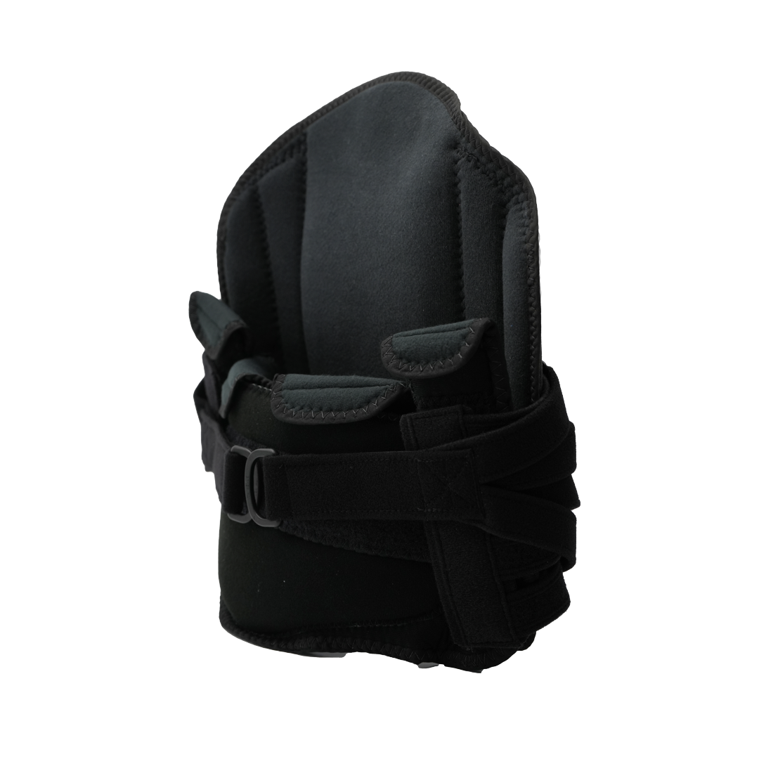 Black lumbar support orthotic brace with adjustable straps and padded back panel.