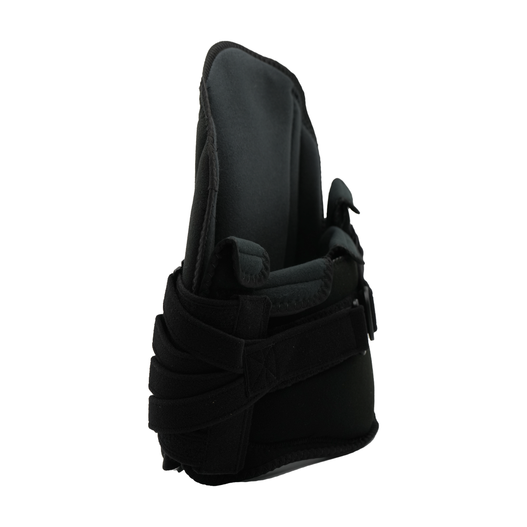Black orthopedic lumbar support brace with adjustable straps and cushioned interior.
