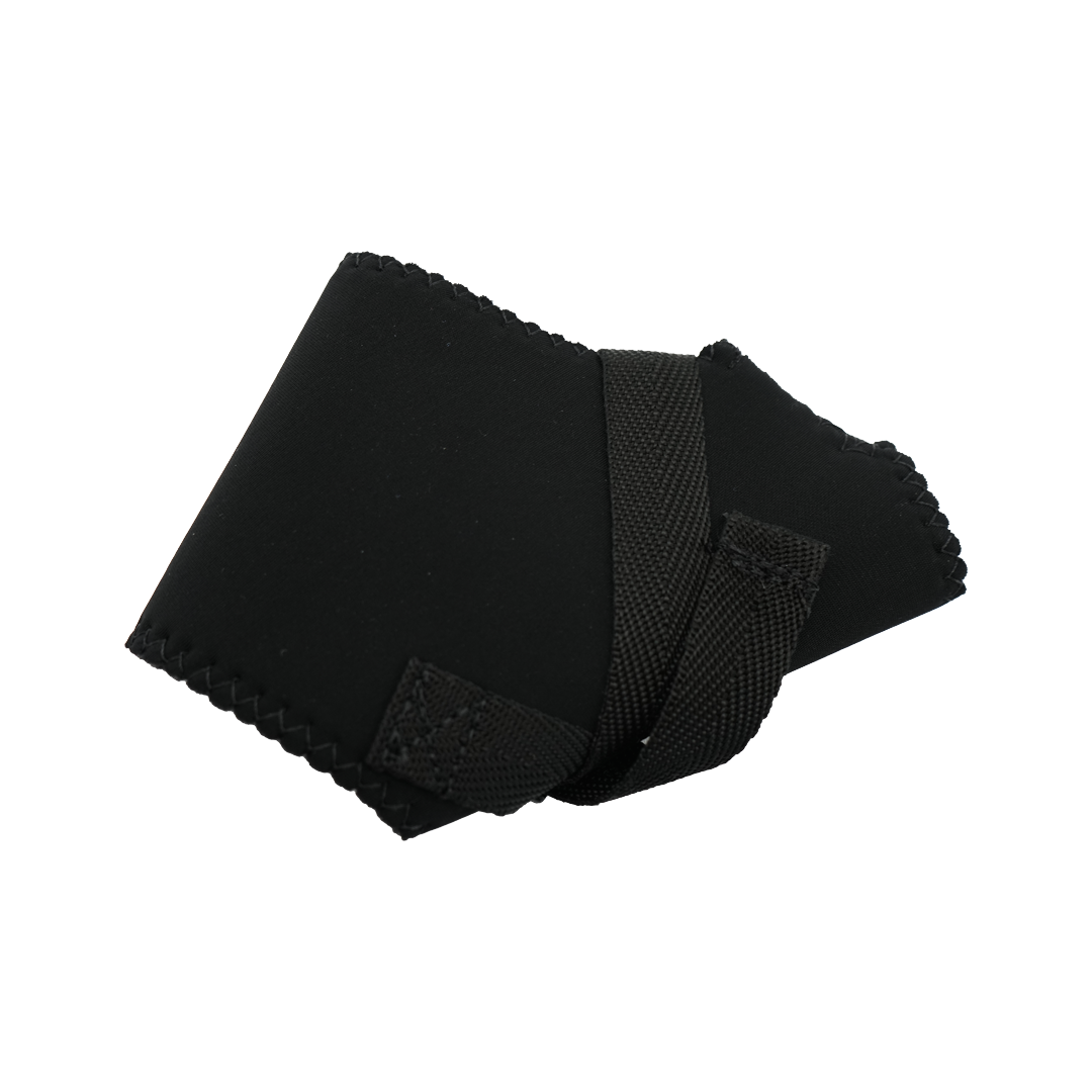Black neoprene wrap-around thumb support with adjustable strap and scalloped edges.