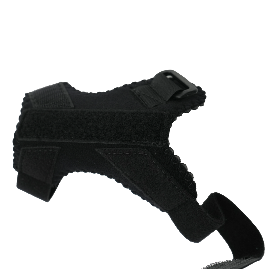 Black pediatric thumb support brace with adjustable Velcro straps and contoured design.