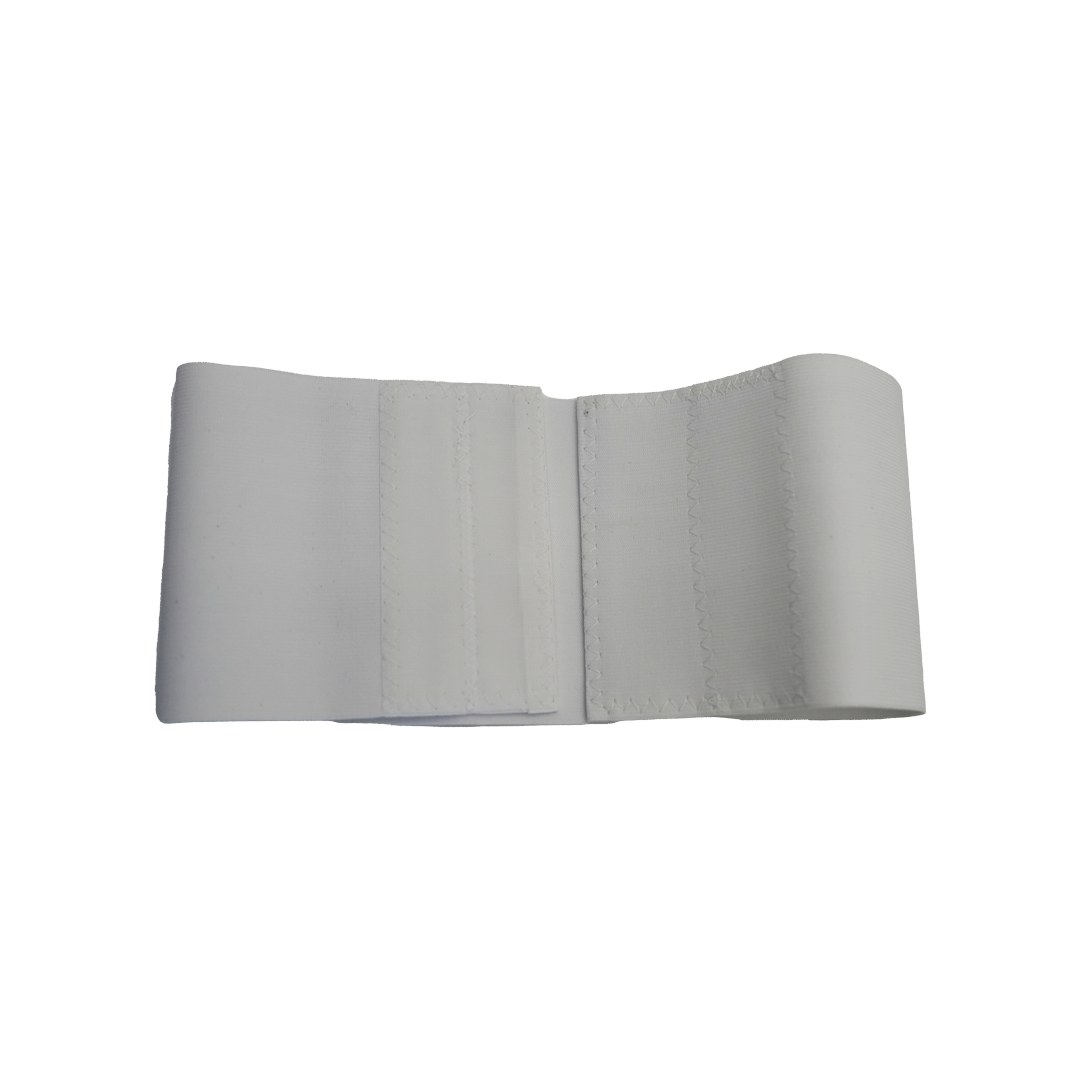 White pediatric abdominal binder with adjustable elastic fabric and Velcro closure.
