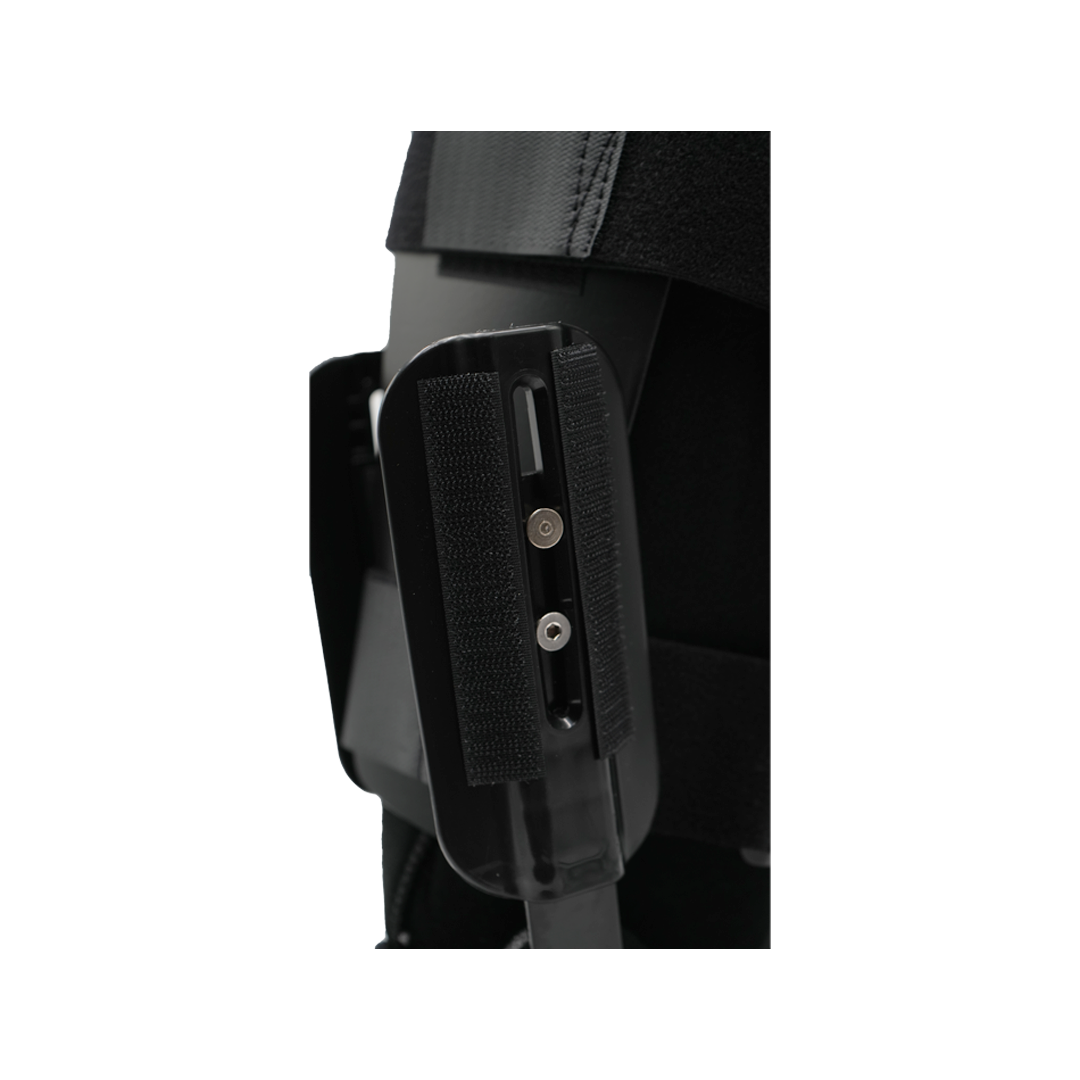 Black orthopedic recovery boot adjustable strap and side support panel close-up.