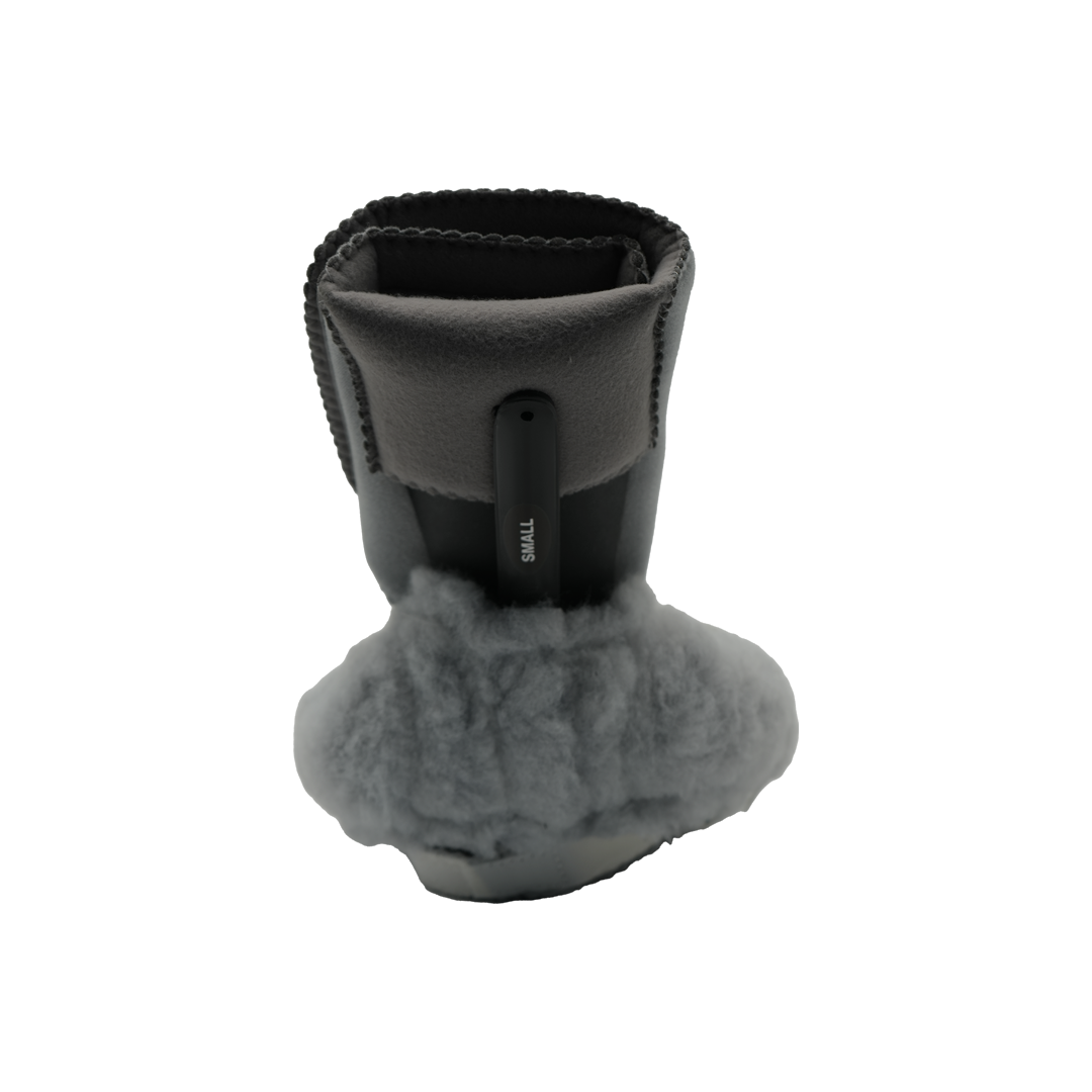 Black and gray back posture support brace with soft gray cushioning at the base.