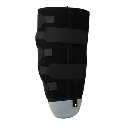 Black below-knee rigid dressing protector with adjustable straps and gray protective cap at the bottom.