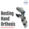 Gray and black resting hand orthosis with adjustable straps and blue accents, made in the USA, RCAI logo visible.