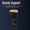 Black RCAI single panel knee immobilizer with adjustable straps and aluminum stays, made in the USA, shown on a flesh-tone.