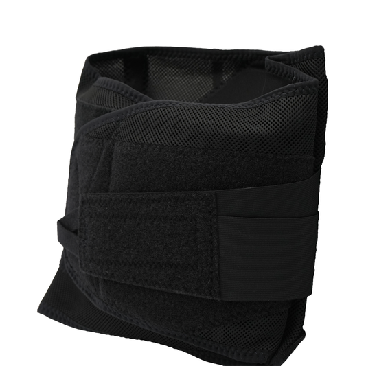 Black lumbar support belt with wide adjustable Velcro straps and breathable mesh fabric.