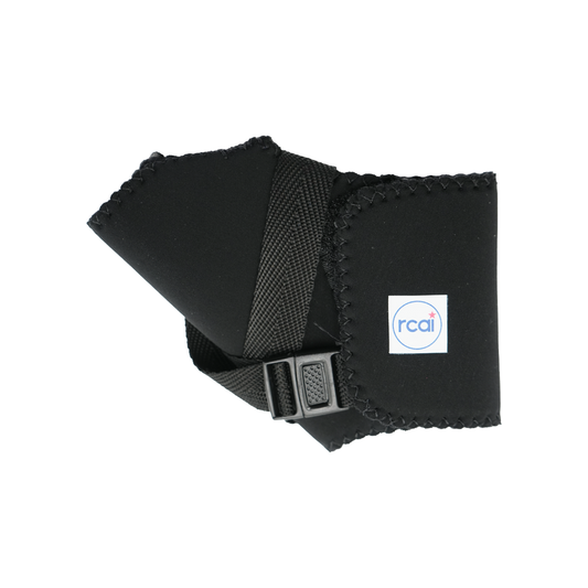 Black wrap around thumb support with elastic strap and plastic buckle, scalloped edges, and white RCAI logo patch.