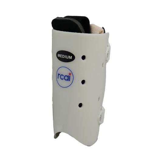 White rigid humeral fracture brace with ventilation holes and black padding, medium size label visible.