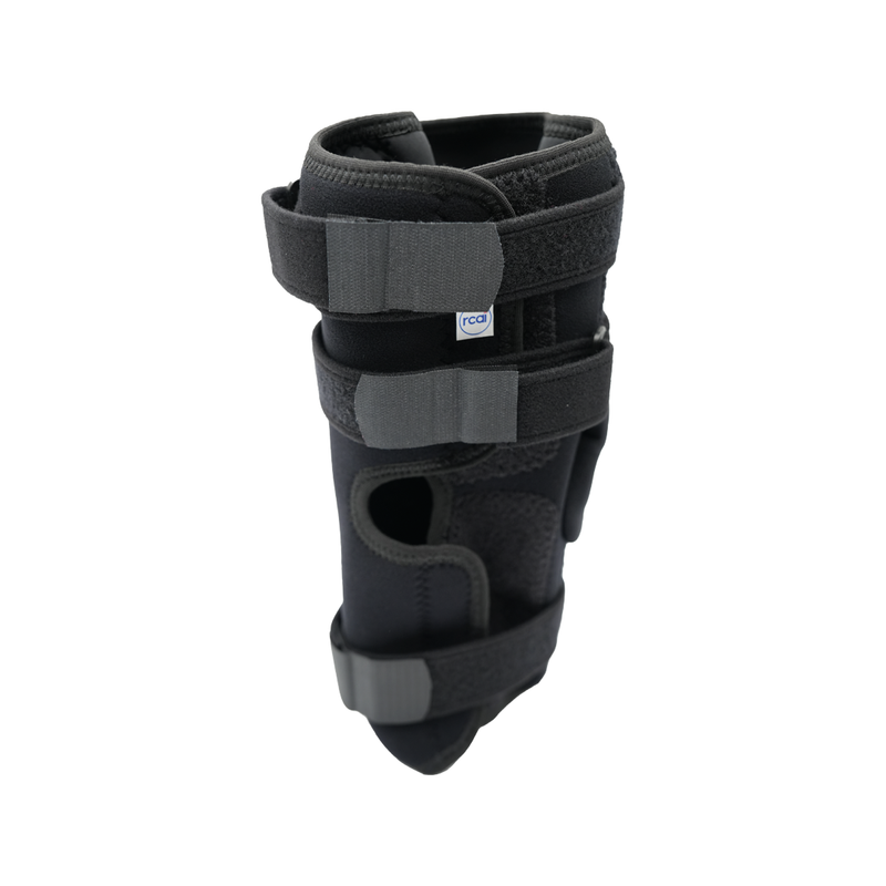 Black RCAI Deluxe Wrap Knee brace with adjustable Velcro straps, breathable padding, made in the USA.