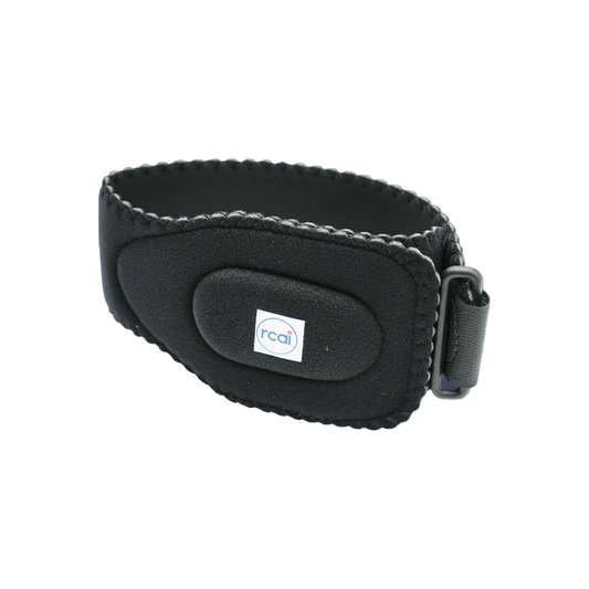 Black adjustable tennis elbow brace with cushioned padding and white RCAI logo patch.