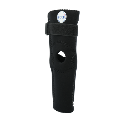 Black hinged elbow sleeve with open-patella design and adjustable Velcro strap, labeled RCAI.
