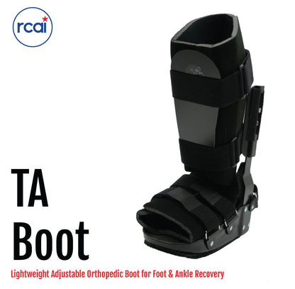 Black lightweight orthopedic recovery boot with adjustable straps and hard plastic support panels.