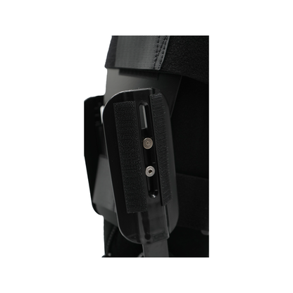 Black orthopedic recovery boot adjustable strap and side support panel close-up.
