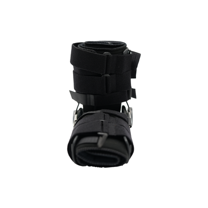Black pediatric leg brace with adjustable straps and metal hinges for support.