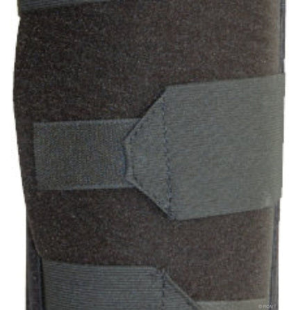 Dark gray rigid dressing protector panel with wide adjustable strap and hook-and-loop closure.