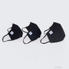 Three black protective face masks in small, universal, and pediatric sizes, each with made in the USA and RCAI tags visible.