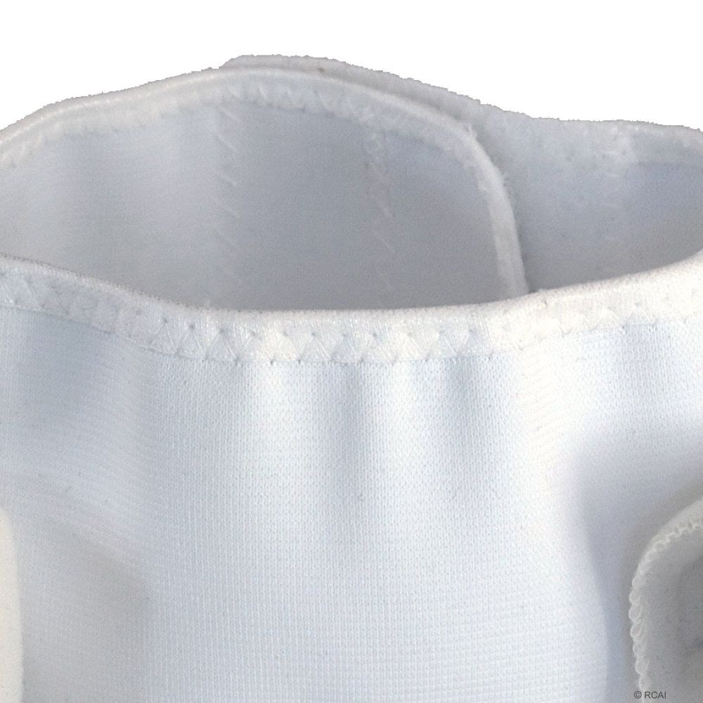 White padded infant shoulder immobilizer with soft fabric and adjustable straps.